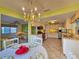 Open concept design with eat-in kitchen view to living area and stainless steel appliances at 3509 Oak Lake Dr, Palm Harbor, FL 34684