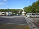 Community RV and boat parking area near the lake, offering convenient storage options at 3509 Oak Lake Dr, Palm Harbor, FL 34684