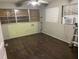 Bedroom showcasing hardwood floors, and windows with blinds at 3512 16Th E St, Bradenton, FL 34208