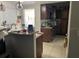 Kitchen featuring dark wood cabinets and breakfast bar at 3512 16Th E St, Bradenton, FL 34208