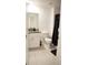Modern bathroom featuring tile flooring, a toilet, a shower and a vanity at 36439 Garden Wall Way, Zephyrhills, FL 33541