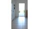 Bright entryway with tiled flooring at 36439 Garden Wall Way, Zephyrhills, FL 33541
