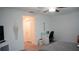 Spacious bedroom with a ceiling fan and carpet flooring at 36439 Garden Wall Way, Zephyrhills, FL 33541
