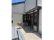 Cozy patio with a grill, outdoor seating and gray concrete flooring at 376 Moorings Cove Dr # 6C, Tarpon Springs, FL 34689
