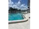 Sparkling community pool with clear blue water, ideal for swimming and enjoying the sunny outdoors at 376 Moorings Cove Dr # 6C, Tarpon Springs, FL 34689