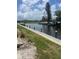Scenic view of a tranquil waterway with lush green surroundings at 376 Moorings Cove Dr # 6C, Tarpon Springs, FL 34689