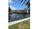 Community waterfront with docks and scenic views of nearby condos at 376 Moorings Cove Dr # 6C, Tarpon Springs, FL 34689