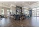 Community cafe with ample seating, TV screens, and a modern design at 4177 Beeswax Ln, Land O Lakes, FL 34638