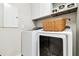 Well-equipped laundry room with modern appliances, cabinets, and practical storage solutions at 4177 Beeswax Ln, Land O Lakes, FL 34638