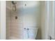 Updated bathroom with sleek tile shower and modern toilet featuring a water-efficient design at 433 Pineapple St, Tarpon Springs, FL 34689
