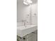 The bathroom includes a modern sink with a sleek faucet and a well lit mirror at 433 Pineapple St, Tarpon Springs, FL 34689