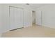 This bedroom features a closet with ample storage space and natural light at 433 Pineapple St, Tarpon Springs, FL 34689