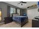 Cozy bedroom with plush carpet, ample natural light from the window, and closet for storage at 4530 Roanoak Way, Palm Harbor, FL 34685