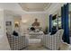 Bright living room features stylish decor, seating, and sliding glass doors to the outdoor living space at 4530 Roanoak Way, Palm Harbor, FL 34685