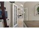 View of the living room from the office through double doors at 4530 Roanoak Way, Palm Harbor, FL 34685