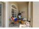 Welcoming front porch featuring comfortable seating and a stylish fire pit feature at 4530 Roanoak Way, Palm Harbor, FL 34685
