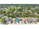 Aerial neighborhood view of community featuring a lake, recreation areas, and residential homes at 4813 Glenaire Ct, Tampa, FL 33624