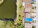 Aerial view of a landscaped backyard and pond at 4813 Glenaire Ct, Tampa, FL 33624