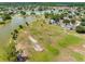 Aerial view of a community pond and soccer fields and landscaping at 4813 Glenaire Ct, Tampa, FL 33624