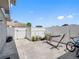 Enclosed backyard featuring a hammock for relaxation on a sunny day at 4813 Glenaire Ct, Tampa, FL 33624