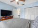 Comfortable bedroom features a ceiling fan and closet at 4813 Glenaire Ct, Tampa, FL 33624