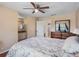 Bright bedroom with wood floors and bathroom access at 4813 Glenaire Ct, Tampa, FL 33624