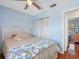 Cozy bedroom with ceiling fan, wood floors and closet space at 4813 Glenaire Ct, Tampa, FL 33624