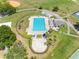 Aerial view of community pool area featuring a large pool, spa, and lounge chairs at 4813 Glenaire Ct, Tampa, FL 33624