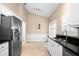 Spacious kitchen featuring stainless steel appliances and tile flooring at 5205 Fairway One Dr, Valrico, FL 33596