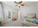 bedroom featuring a ceiling fan and closet at 5411 Thistle Field Ct, Wesley Chapel, FL 33545