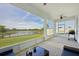 Relax on the screened lanai and enjoy the beautiful water view at 5411 Thistle Field Ct, Wesley Chapel, FL 33545