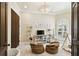 Bright bedroom with two bean bag chairs, pendant lighting, and a play tent near the window at 6008 Interbay Blvd, Tampa, FL 33611