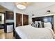 Bedroom with a large bed, two closets and an ensuite bar/sink area at 6008 Interbay Blvd, Tampa, FL 33611