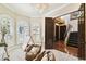 Open doorway reveals a bedroom with play tent, arched windows, and staircase access at 6008 Interbay Blvd, Tampa, FL 33611