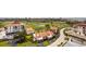 Stunning aerial view of community, golf course, ponds and residential buildings at 6265 Sun Blvd # 1203, St Petersburg, FL 33715