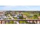 Panoramic view of the community, showcasing golf courses and nearby city skyline at 6265 Sun Blvd # 1203, St Petersburg, FL 33715