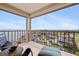 Inviting balcony with comfortable seating and a view of the community, offering a relaxing outdoor space at 6265 Sun Blvd # 1203, St Petersburg, FL 33715