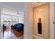 Comfortable bedroom with hardwood floors and a serene view of the outside waterways and green space at 6265 Sun Blvd # 1203, St Petersburg, FL 33715