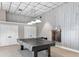 Game room with ping pong table and pool cues at 6265 Sun Blvd # 1203, St Petersburg, FL 33715