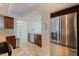 Modern kitchen featuring stainless steel appliances, wood cabinets and tile floors at 6265 Sun Blvd # 1203, St Petersburg, FL 33715