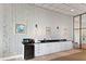 Kitchenette featuring white cabinets and a mini fridge at 6265 Sun Blvd # 1203, St Petersburg, FL 33715