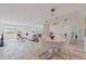 Bright and open living room with travertine floors and waterfront views at 6265 Sun Blvd # 1203, St Petersburg, FL 33715