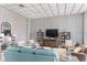 Lounge area with comfortable seating and bookshelves at 6265 Sun Blvd # 1203, St Petersburg, FL 33715