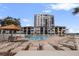 Beautiful pool and sun loungers overlook manicured landscaping and the waterfront at 6265 Sun Blvd # 1203, St Petersburg, FL 33715