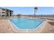 Inviting pool overlooking water and clear blue sky at 6265 Sun Blvd # 1203, St Petersburg, FL 33715