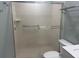 Bathroom featuring a shower with sliding glass door and a vanity with a white countertop at 6520 Thicket Trl, New Port Richey, FL 34653