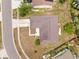 Aerial view of home showcasing roof, driveway, and landscaping at 6826 Rosemary Dr, Tampa, FL 33625