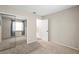 Bedroom with carpet, sliding closet doors, and natural light streaming through the window at 6826 Rosemary Dr, Tampa, FL 33625