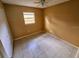 Cozy bedroom with a ceiling fan and neutral paint tones, offers a serene and welcoming space at 7001 86Th N Ave, Pinellas Park, FL 33782