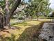 Front yard with mature trees in a quiet neighborhood at 7001 86Th N Ave, Pinellas Park, FL 33782
